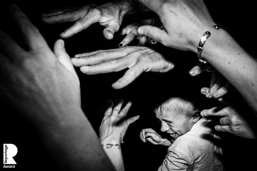 This is reportage award wedding photographer